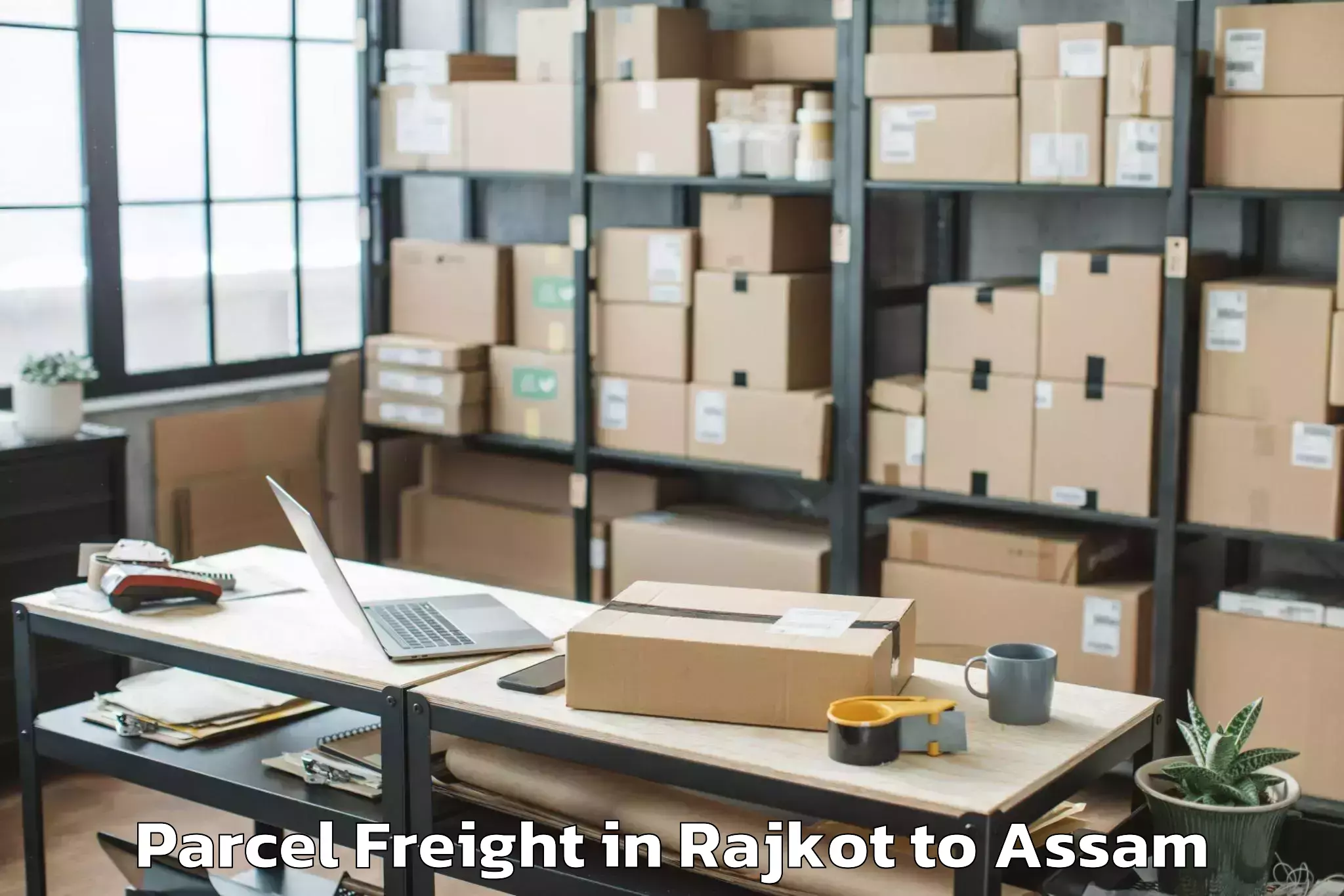 Rajkot to Lilabari Airport Ixi Parcel Freight